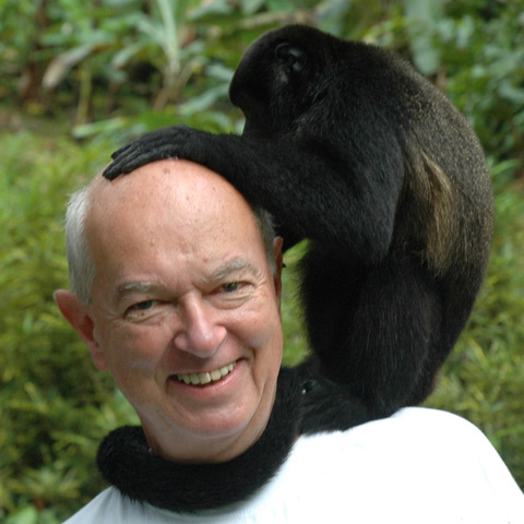 Man with a monkey on his shoulder