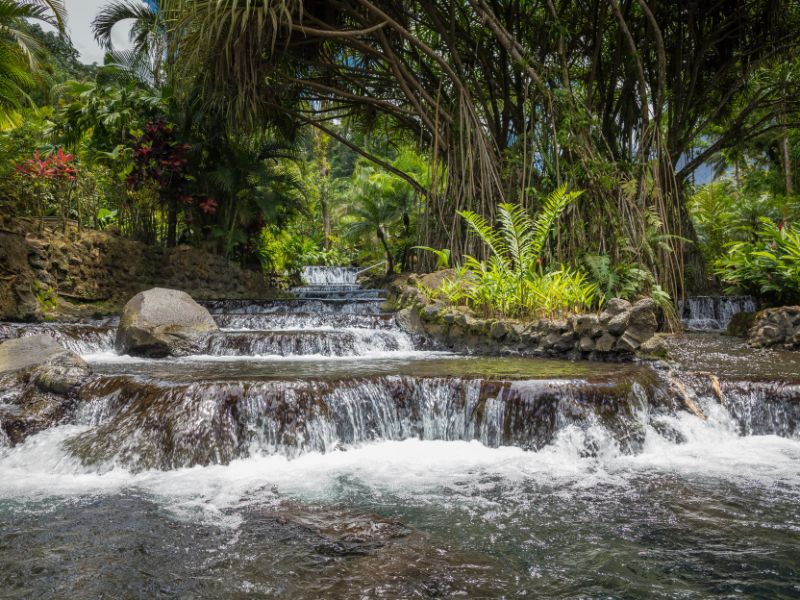Hot springs waterfalls with lush greenery