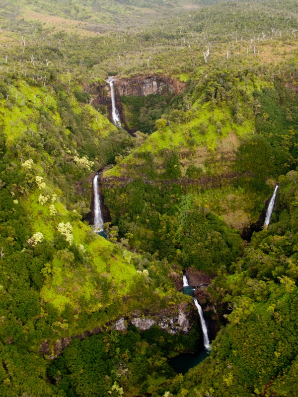 Aerial view of 5 waterfalls on the same mountain.