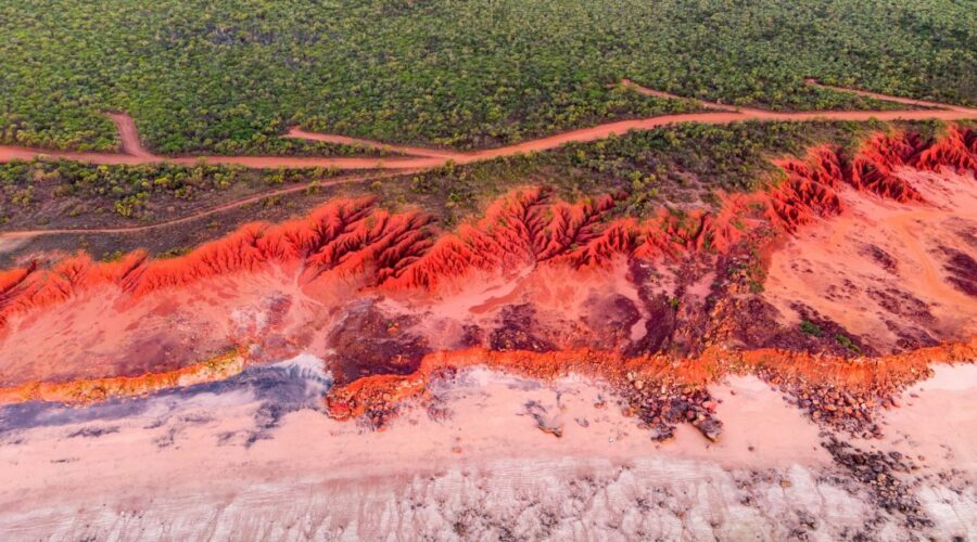 7 Most Vibrant Red Sand Beaches